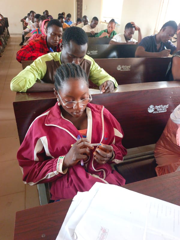 University students take exam in Akwanga Nigeria classroom