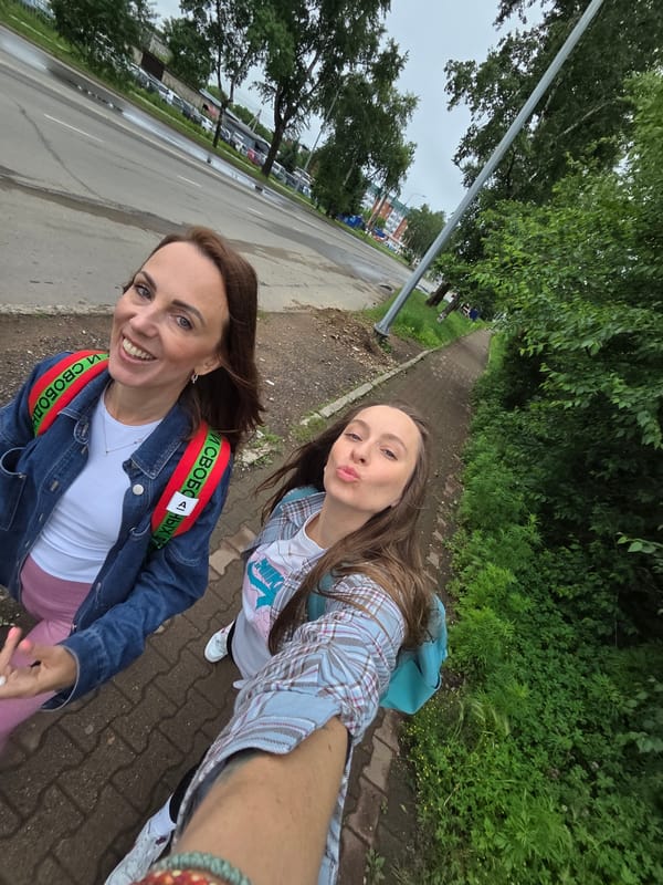 Rainy afternoon stroll through Birobidzhan with wildflowers and scooters