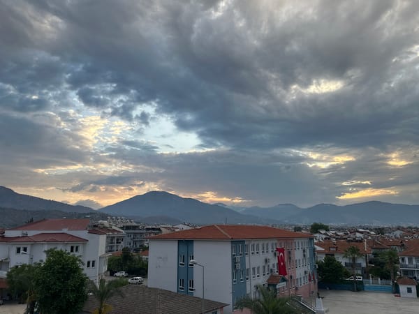 Dawn breaks over red rooftops in Fethiye, Turkey