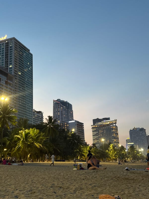 Tourist documents daily life scenes across Nha Trang Vietnam
