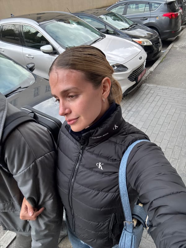 Woman takes bathroom selfie in Tbilisi public restroom