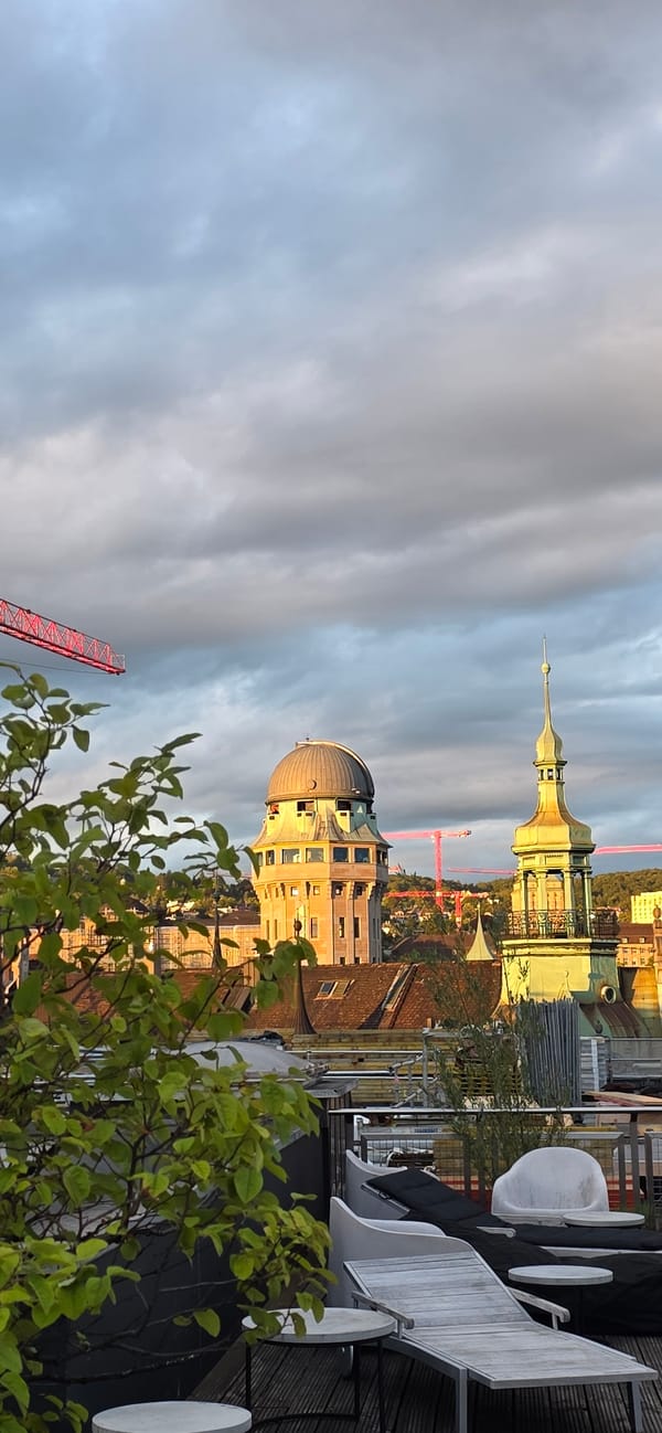 Evening cityscape views captured across European city rooftops