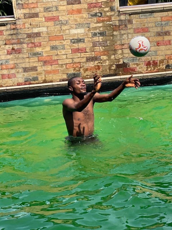 Swimming pool hangout with green water and games