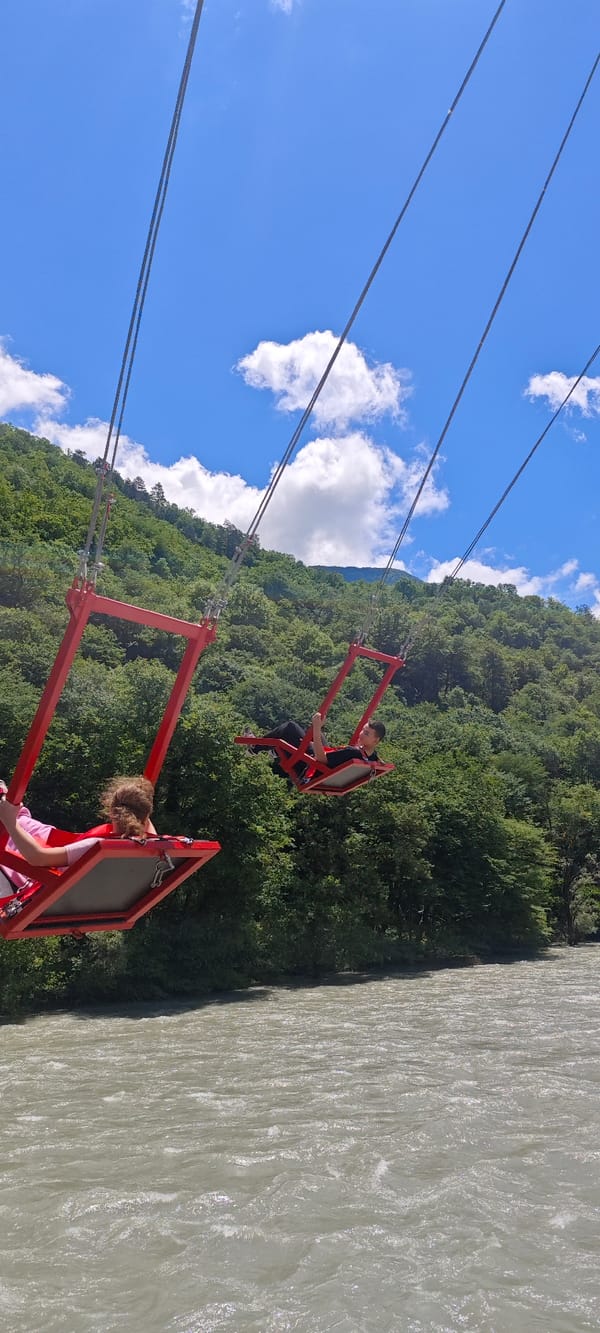 Giant swing ride thrills visitors above river in Abkhazia