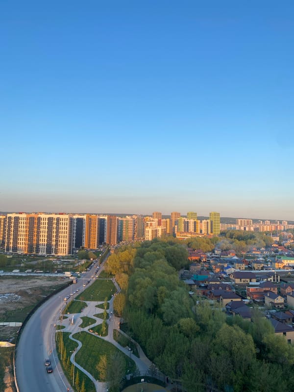 Aerial view captures Kazan cityscape under clear skies