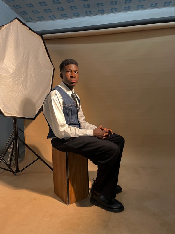 Studio photo shoot captured by witness in professional setting