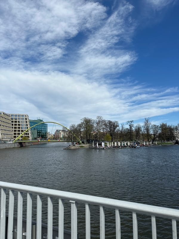 Bronze dwarf statues spotted throughout Wrocław's historic Market Square