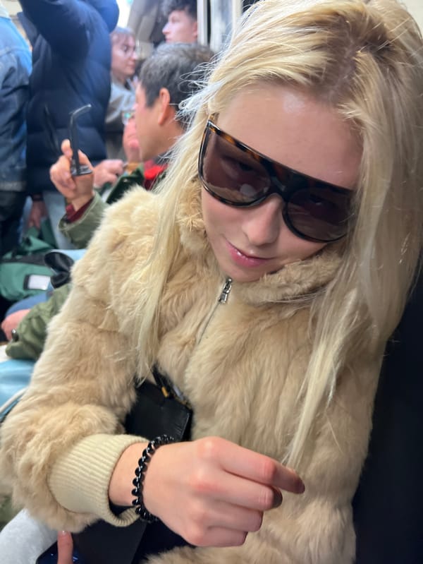 Blonde woman in fur coat spotted in Paris