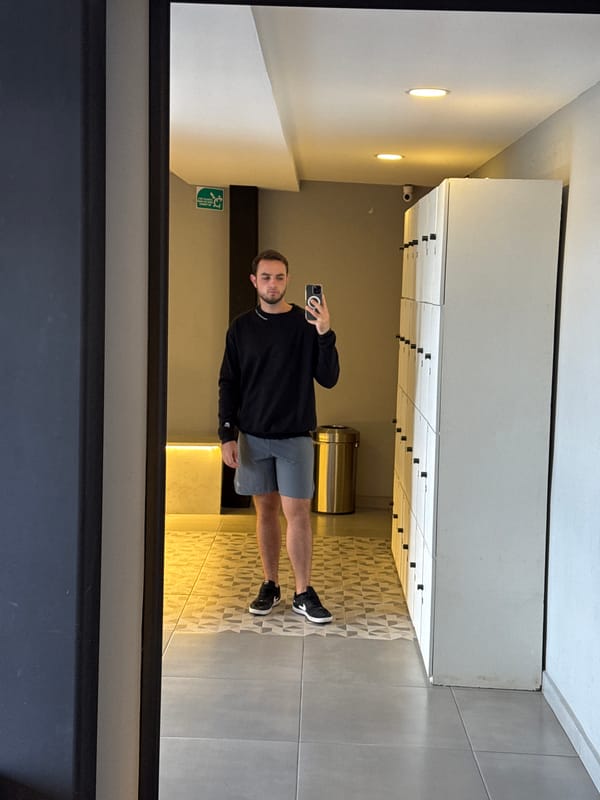 Man Takes Selfies Near Motivational Mirror in Mexican Town