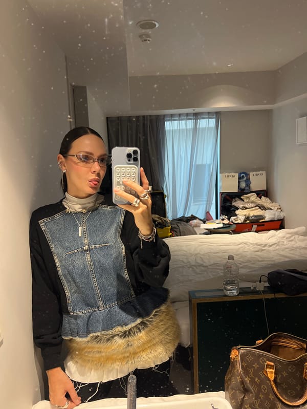 Late-night selfie captured in Shibuya mirror