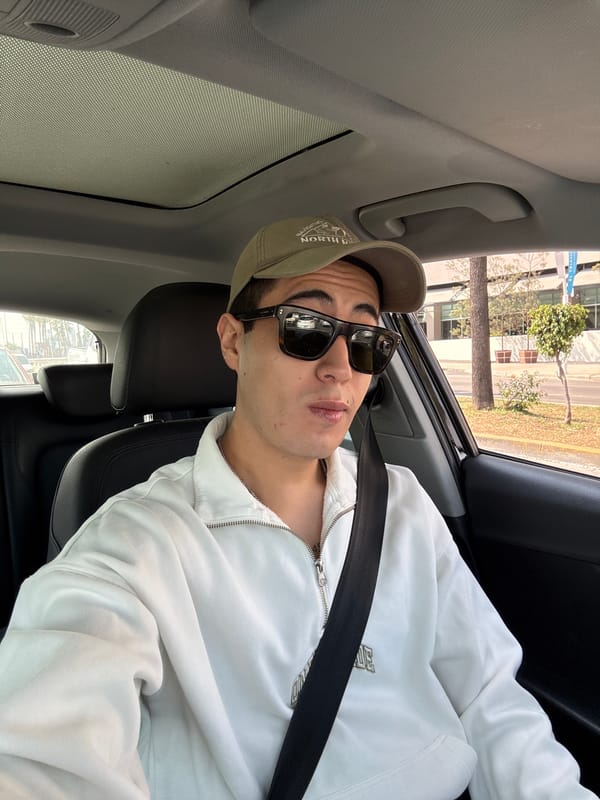 Person takes car selfies while traveling through Puebla traffic