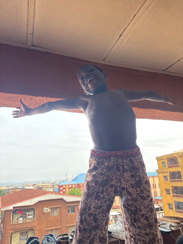 Young person's morning moments captured in Onitsha, Nigeria