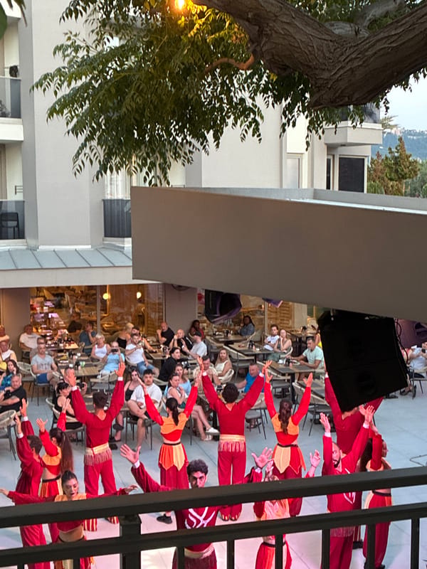 Evening cultural performance and beach life captured in Alanya