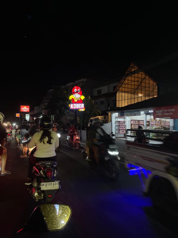 Scooter ride through Denpasar, day to night