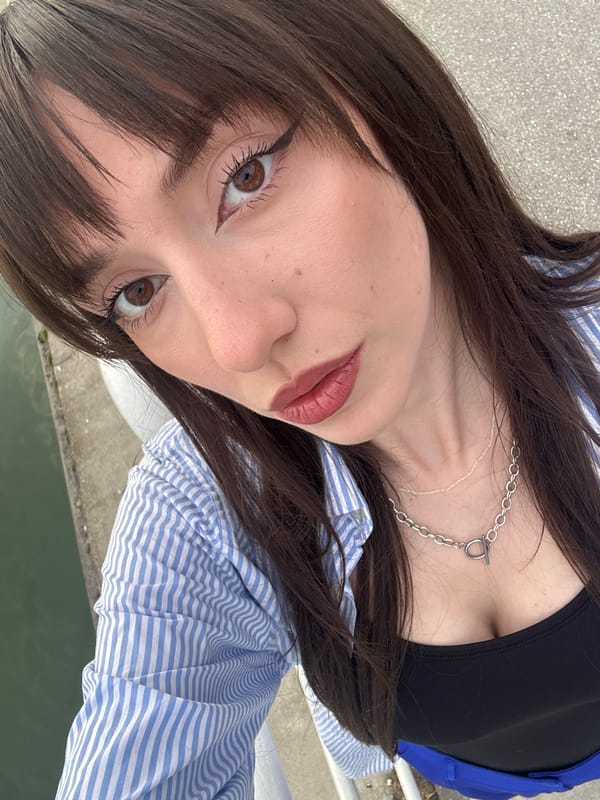 Woman takes selfies near Belgrade's Sava River waterfront