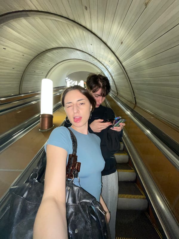 Playful escalator selfie in the Moscow Metro