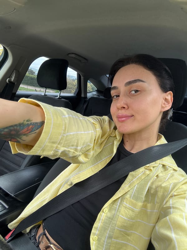 Passenger takes morning selfie in car in Tbilisi