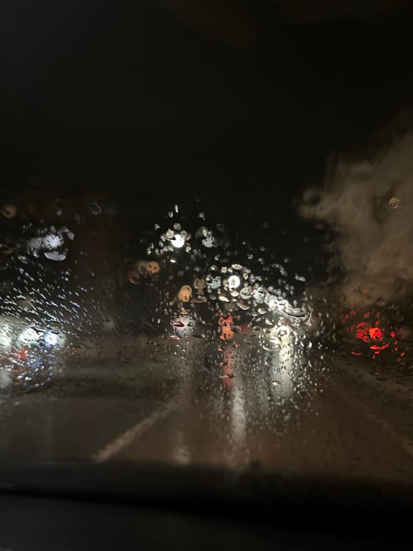 Driver uses GPS navigation during rainy evening in Montana, Bulgaria