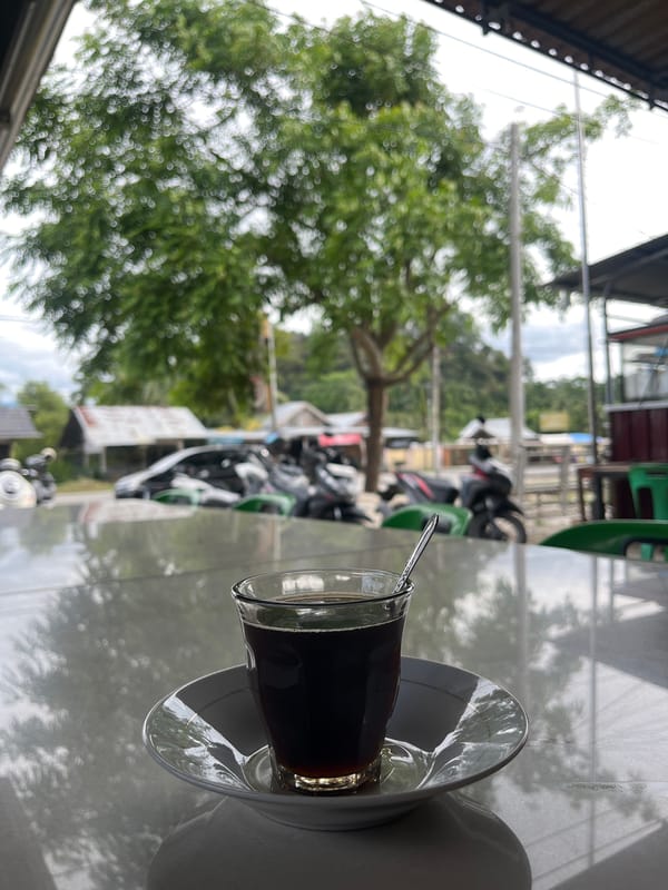 Morning coffee and street life in Keude Trienggadeng