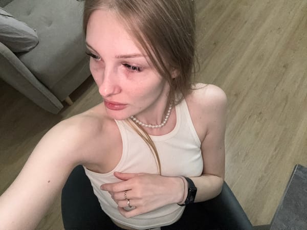 Woman photographed in emotional moment in Perm apartment