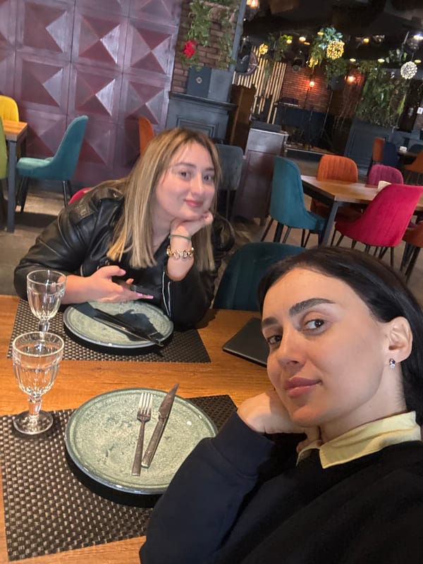 Woman takes selfies at Tbilisi restaurant Monday morning