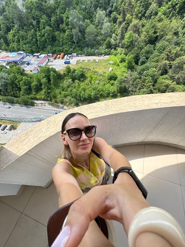 Balcony views and selfies over green Sochi hillsides