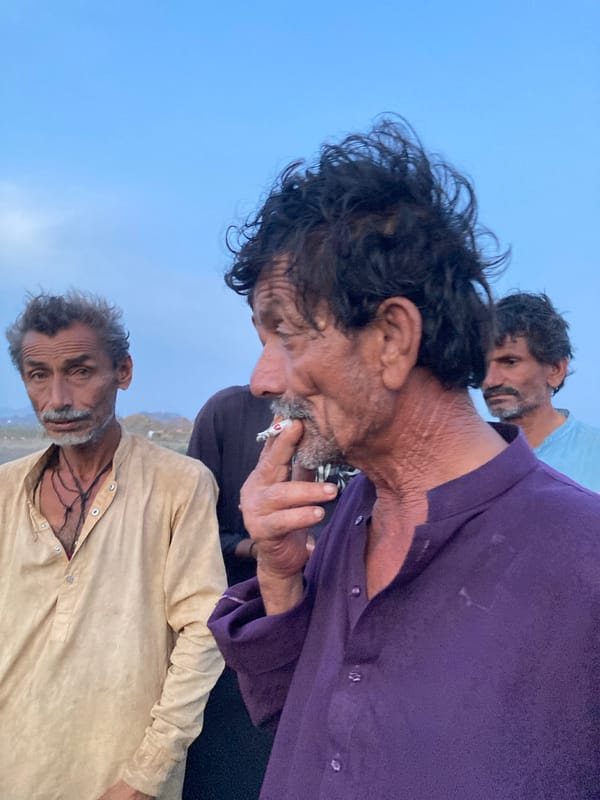 Rural gathering with rifles documented in Wayara, Pakistan