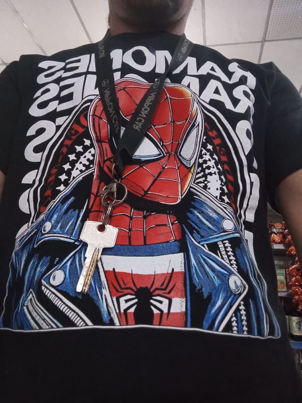 Man spotted wearing Spider-Man t-shirt in Buenos Aires indoor setting