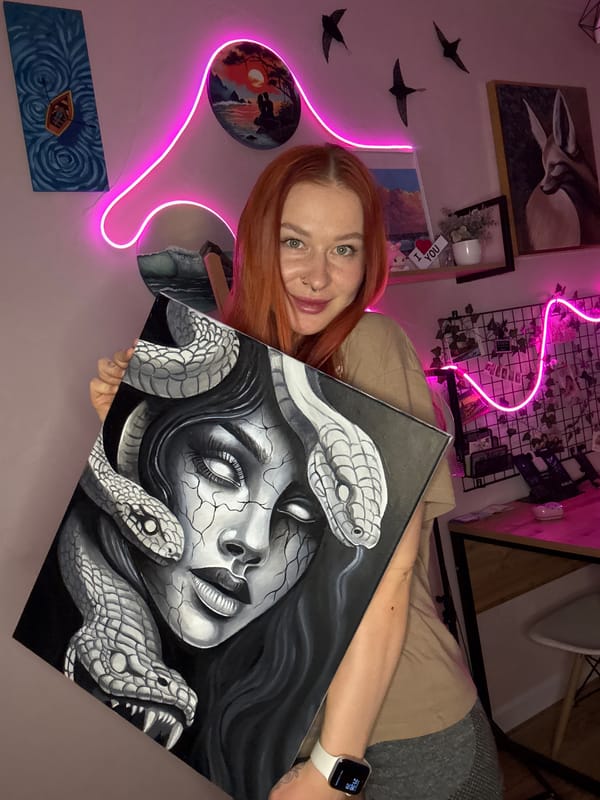 Woman poses with Medusa painting in Rostov-on-Don art space