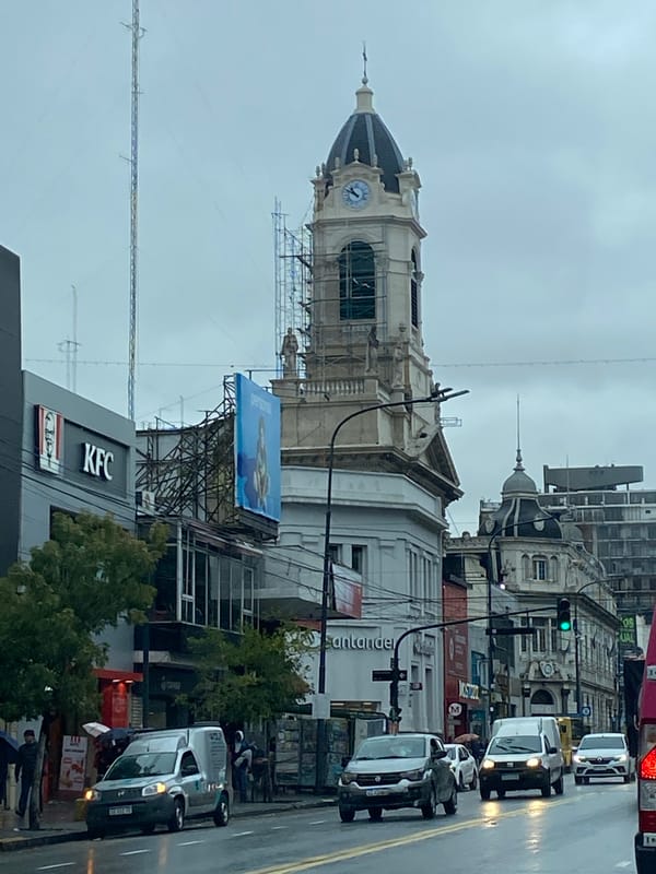 Street scene captured in Buenos Aires featuring KFC, construction