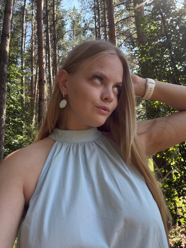 Playful selfie session in a pine forest near Izhevsk