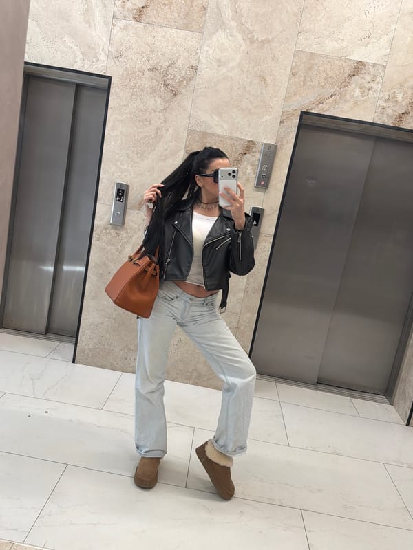 Person takes elevator selfie in marble-walled lift in Voronezh