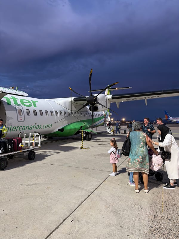 Turboprop aircraft spotted on evening tarmac in San Bartolomé