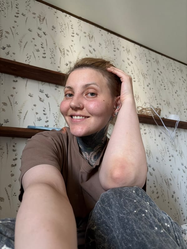 Woman takes selfie indoors in Chaikovsky, Russia