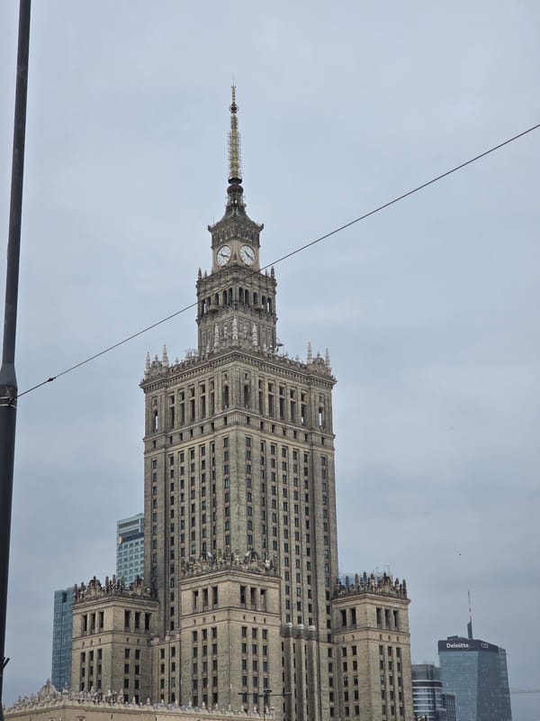 Warsaw Palace of Culture observed under overcast morning skies