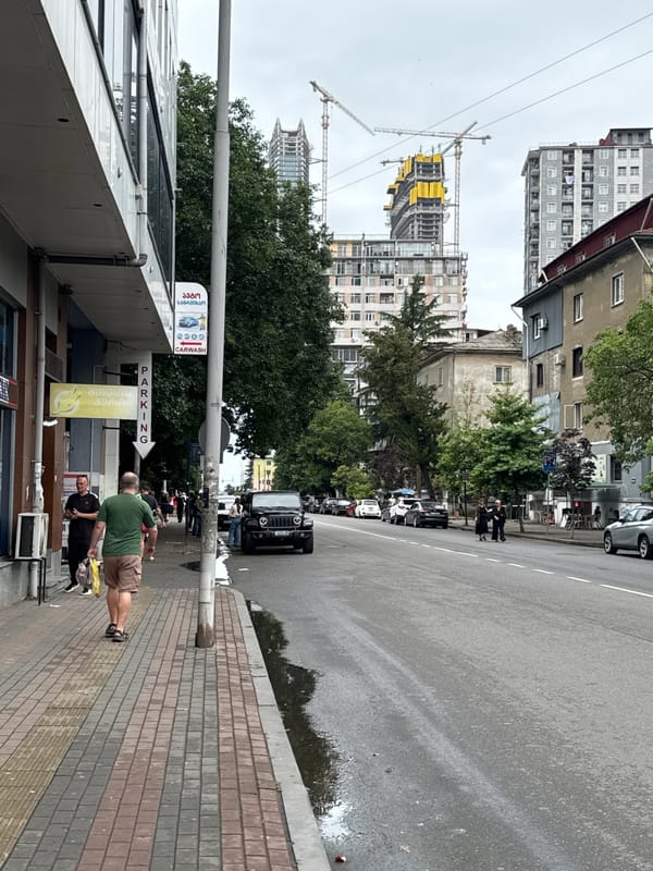 Ordinary morning on Batumi's streets, murals to Brutalist blocks