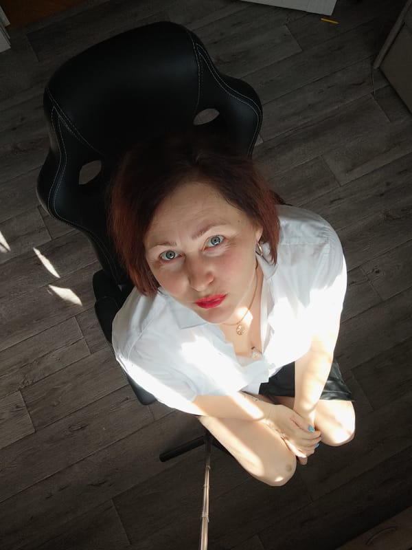 Woman and white cat observed in Markovskii home