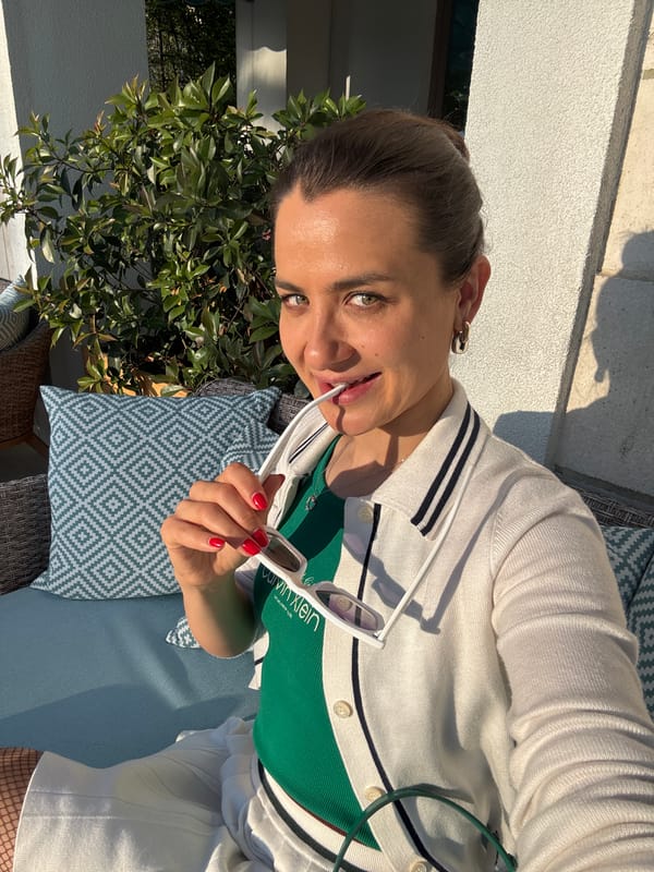 Evening social gathering at Tivat marina cafe during sunset