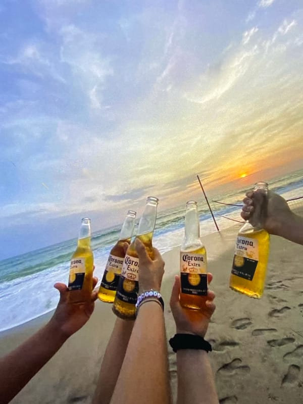 Beach hangout with Corona, campfire snacks, and Uno