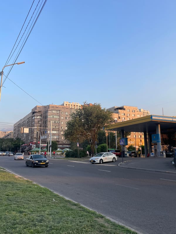 Golden hour street life around Almaty's Sairan metro area
