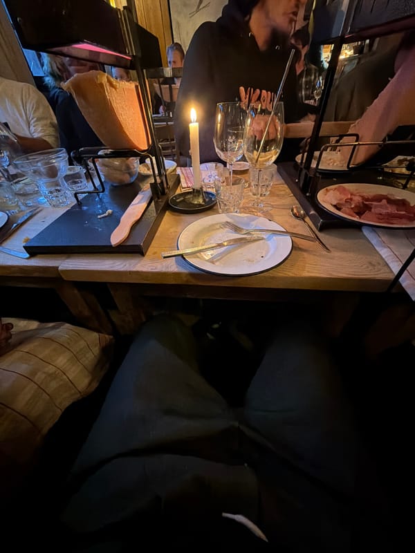 Traditional raclette dinner observed in La Clusaz, France