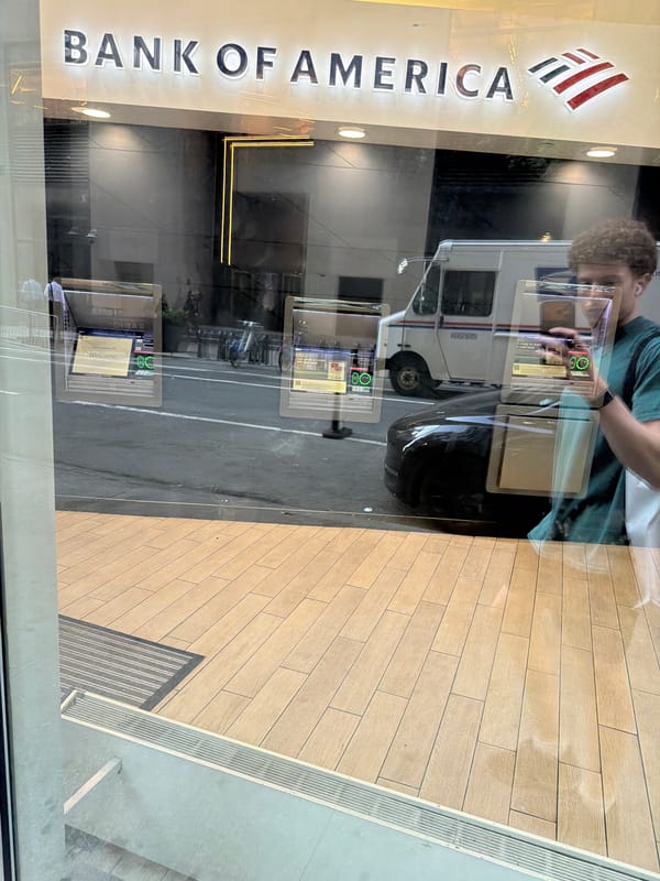 Person photographed outside NYC Bank of America branch
