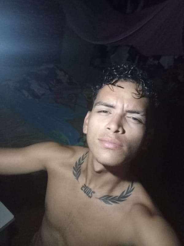 Man takes late-night selfies in Venezuelan bedroom