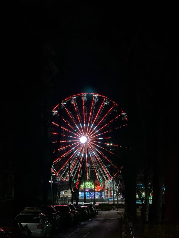 Colorful Ferris wheel lights up Sofia evening sky