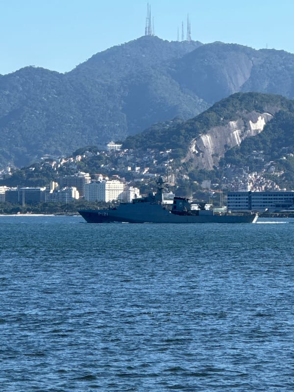Navy ships and city skyline across Guanabara Bay