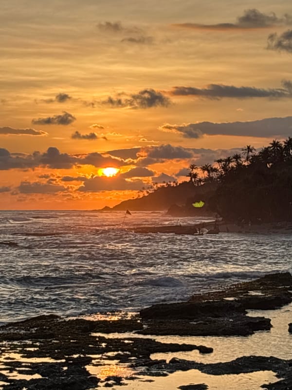Sunset documented by witnesses at Thalaramba coastline, Sri Lanka