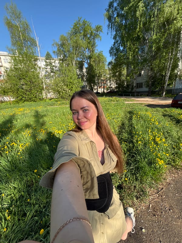 Woman with dog enjoys early morning in Izhevsk park