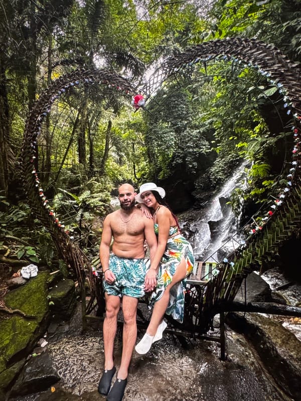 Couple photographed at Bali waterfall and temple locations