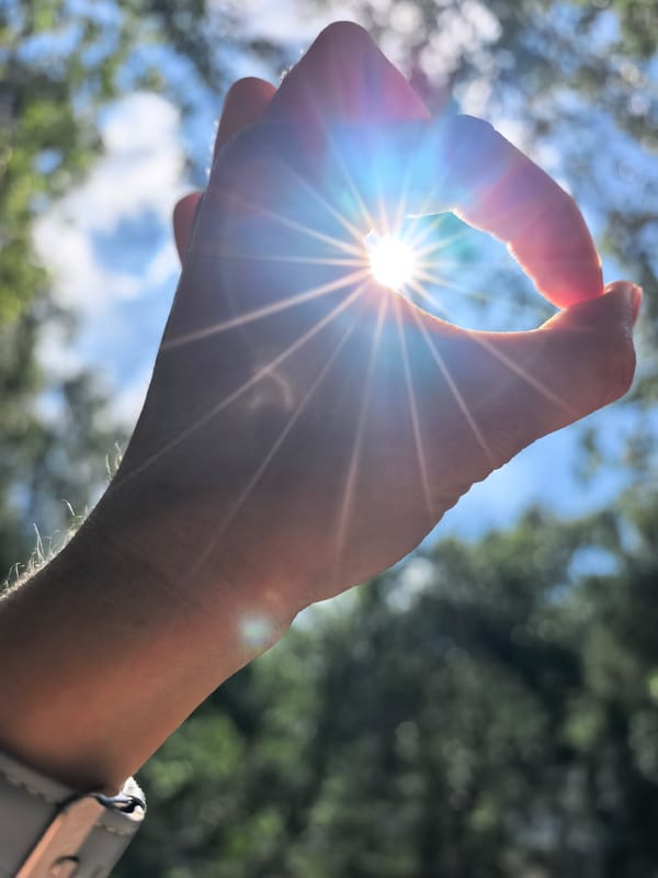 Woman takes sunny morning selfies in Sterlitamak park