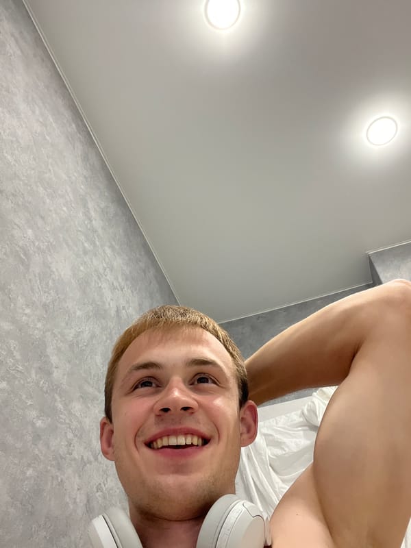 Indoor workout and selfie session with white headphones